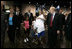 Laura Bush is greeted by three youngsters upon her arrival Monday, Sept. 19, 2005, to "Operation Compassion" at George R. Brown Convention Center in Houston.