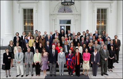 Laura Bush stands with guests of the National Book Festival Author's breakfast on the North Portico of the White House Saturday, Sept. 24, 2005.