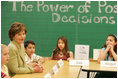 Mrs. Laura Bush listens to students during a visit to Bel Air Elementary School in Albuquerque, N.M., Monday, April 3, 2006, during a lesson called Protecting You/Protecting Me, to teach the prevention of substance and alcohol abuse. Protecting You/Protecting Me is a curriculum developed and supported by Mothers Against Drunk Driving, for children in grades 1-5, focusing on the effects of alcohol on the developing brain during the first 21 years of life.