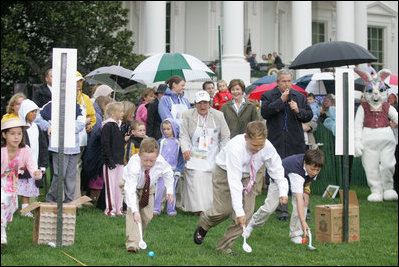 Mrs. Laura Bush and President George W. Bush welcome guests to the 2006 White House Easter Egg Roll, Monday, April 17, 2006, a tradition on the South Lawn of the White House since 1878.