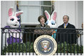 Mrs. Laura Bush and President George W. Bush welcome guests to the 2006 White House Easter Egg Roll, Monday, April 17, 2006, a tradition on the South Lawn of the White House since 1878.