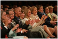 Mrs. Laura Bush, joined by, from left, Robert D. Coombe, Ph.D., Chancellor, University of Denver, Jordan Suniga, Student, Grace Keirnes, Student, and Lt. Governor Jane E. Norton, Lt. Governor of Colorado, attends the second regional Helping America's Youth Conference on Friday, August 4, 2006, in Denver, Colorado. According to the Department of Defense there are approximately 189, 000 children of deployed parents nationwide.