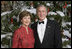 President George W. Bush and Mrs. Laura Bush pose for their official 2006 Holiday Portrait in the Blue Room of the White House. 