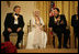 Conductor Zubin Mehta laughs with singers Dolly Parton and William "Smokey" Robinson during a reception for the Kennedy Center honorees in the East Room Sunday, Dec. 3, 2006.