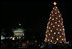 Crowds on the Ellipse in Washington, D.C., watch the annual lighting of the National Christmas Tree, attended by President George W. Bush and Laura Bush, Thursday evening, Dec. 7, 2006, during the 2006 Christmas Pageant of Peace.