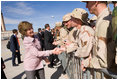 Mrs. Laura Bush greets base personnel from Kirtland Air Force Base Friday, Feb. 3, 2006, before departing Albuquerque for Dallas.