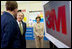 President George W. Bush and Laura Bush tour the 3M Research and Development Laboratory in Maplewood, Minn., Thursday, Feb. 2, 2006.