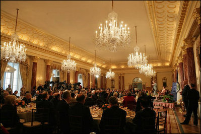 After being introduced by Laura Bush, Karen Hughes, Under Secretary of State for Public Diplomacy and Public Affairs, addresses the U.S. University Presidents Summit on International Education at the U.S. State Department Friday, Jan. 6, 2006.