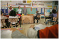 President George W. Bush and Mrs. Laura Bush visit students at North Glen Elementary School in Glen Burnie, Md., Monday, Jan. 9, 2006. "It is a really important piece of legislation that is working. And I'm here today to talk about the spirit of the No Child Left Behind Act, the evidence that says it's working, and my deep desire to work with Congress to make sure it continues to have the desired effect on children all across the country," said the President during his remarks.