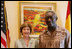 Mrs. Laura Bush is seen at the residence of the U.S. Ambassador to Ghana, welcomed by Ghana President John Agyekum Kufuor in Accra, Ghana, Sunday, Jan. 15, 2006.