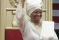 Liberian President Ellen Johnson Sirleaf waves to the audience at her inauguration in Monrovia, Liberia, Monday, Jan. 16, 2006. President Sirleaf is Africa's first female elected head of state. Mrs. Laura Bush and U.S. Secretary of State Condoleezza Rice attended the ceremony.