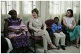 Mrs. Laura Bush and her daughter Barbara talk with patients, their family members and staff at the Korle-Bu Treatment Center, Tuesday, Jan. 17, 2006 in Accra, Ghana.