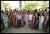 Mrs. Laura Bush poses with Peace Corps volunteers Tuesday, Jan. 17, 2006, at the home of the U.S. Ambassador in Accra, Ghana. Ghana was the first assignment for the organization, which marks its 45th anniversary this year.