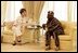 Mrs. Laura Bush visits with Nigeria President Olusegun Obasanjo Wednesday, Jan. 18, 2006, at the presidential villa in Abuja, Nigeria.