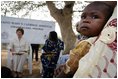 Mrs. Bush sits outside at Saint-Mary's Catholic Hospital in Gwagwalada, Nigeria Wednesday, Jan. 18, 2006, where she announced a $163 million commitment by the United States to Nigeria to battle AIDS.