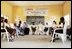 Laura Bush and daughter Barbara participate in a round-table discussion with students Wednesday, Jan. 18, 2006, at Model Secondary School in Abuja, Nigeria.