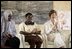 Laura Bush applauds during her visit Wednesday, Jan. 18, 2006, to Model Secondary School in Abuja, Nigeria.