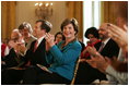 Laura Bush applauds The Moving in the Spirit dancers performance Wednesday, Jan. 25, 2006 in the East Room of the White House, during the President's Committee on the Arts and the Humanities 2006 Coming Up Taller Awards ceremony.