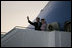 President George W. Bush and Mrs. Laura Bush wave upon arrival of Air Force One to Rostock-Laage Airport in Rostock, Germany on July 12, 2006. The couple is visiting with Germany's Chancellor Angela Merkel before proceeding to Russia for the G8 Summit.