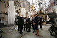 German Chancellor Angela Merkel, President George W. Bush and Laura Bush tour St. Nikolai Church in Stralsund, Germany, Thursday, July 13, 2006.