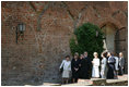 Mrs. Laura Bush is escorted on a tour outside the City of Stralsund Archives in Stralsund, Germany, Thursday, July 13, 2006, by Dr. Hans-Joachim Hacker, director of the City of Stralsund Archives.