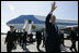 President George W. Bush and Laura Bush arrive Friday, July 14, 2006, to St. Peterburg's Pulkovo Airport, waving to well-wishers waiting to greet them. President Bush will attend the G8 Summit over the weekend.