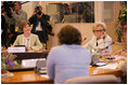 Mrs. Laura Bush and Bernadette Chirac, wife of French President Jacques Chirac participate in a meeting with other spouses of G8 leaders during the G8 Summit at Konstantinvosky Palace in Strelna, Russia, Sunday, July 16, 2006.