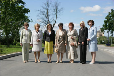 Spouses of G8 leaders pose for a photograph at Konstantinvosky Palace in Strelna, Russia, Sunday, July 16, 2006. From left, they are: Laura Bush; Bernadette Chirac, wife of French President Jacques Chirac; Sousa Uva Barroso, wife of European Commission President Jose Manuel Barroso; Flavia Franzoni, wife of Italian Prime Minister Romano Prodi, Lyudmila Putina, wife of Russian President Vladimir Putin; Laureen Harper, wife of Canadian Prime Minister Stephen Harper; and Cherie Booth, wife of British Prime Minister Tony Blair.