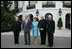 President George W. Bush and Laura Bush welcome outgoing Archbishop of Washington Theodore Cardinal McCarrick, left, the incoming Archbishop of Washington Donald W. Wuerl, right, and Papal Nuncio Pietro Sambi to the White House Tuesday evening, July 18, 2006, for a dinner in their honor.