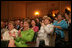 Mrs. Laura Bush applauds the speakers participating in the National Endowment for the Arts Big Read event Thursday, July 20, 2006, at the Library of Congress in Washington. The Big Read is a new program to encourage the reading of classic literature by young readers and adults.