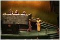 Mrs. Laura Bush walks to meet UN Protocol Officer Mary Muturi of Kenya after addressing the United Nations General Assembly's High-Level Meeting on AIDS at the United Nations in New York Friday, June 2, 2006.