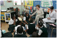 Mrs. Laura Bush talks with students during her visit to Our Lady of Perpetual Help School in Washington, Monday, June 5, 2006, where she announced a Laura Bush Foundation for America's Libraries grant to the school. Mrs. Bush is joined by Our Lady of Perpetual Help fifth grade teacher Julie Sweetland, right. 