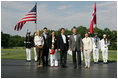 President George W. Bush and Mrs. Laura Bush welcome Prime Minister Anders Fogh Rasmussen of Denmark and his family to Camp David Friday, June 9, 2006. Pictured, from left, are the Prime Minister's daughter-in-law Kristina, son Henrik and wife Anne-Mette Rasmussen.