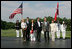 President George W. Bush and Mrs. Laura Bush welcome Prime Minister Anders Fogh Rasmussen of Denmark and his family to Camp David Friday, June 9, 2006. Pictured, from left, are the Prime Minister's daughter-in-law Kristina, son Henrik and wife Anne-Mette Rasmussen.