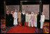 Mrs. Laura Bush joins Nancy Brinker, founder of the Susan G. Komen Breast Cancer Foundation, fourth from left, and women from Saudi Arabia and the United Arab Emirates, Monday, June 12, 2006, at the Susan G. Komen Breast Cancer Foundation's 2006 Mission Conference in Washington, D.C. Mrs. Bush announced the U.S.-Middle East Partnership for Breast Cancer Awareness and Research which allows governments, hospitals, researchers, and survivors to work with each other to help defeat breast cancer.