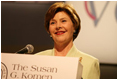 Mrs. Laura Bush addresses an audience at the Susan G. Komen Breast Cancer Foundation's 2006 Mission Conference in Washington, DC. Mrs. Bush announced the U.S.-Middle East Partnership for Breast Cancer Awareness and Research which allows governments, hospitals, researchers, and survivors to work with each other to help defeat breast cancer.The partnership will include the U.S. State Department, the Susan G. Komen Foundation, MD Anderson Cancer Center, The John Hopkins University and both the United Arab Emirates and the Kingdom of Saudi Arabia.