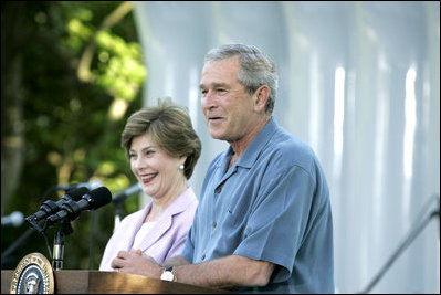 President George W. Bush and Laura Bush welcome guests to the annual Congressional Picnic on the South Lawn of the White House Wednesday evening, June 15, 2006, hosting members of Congress and their families to the "Rodeo" theme picnic.