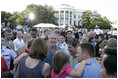 President George W. Bush welcomes guests to the annual Congressional Picnic on the South Lawn of the White House Wednesday evening, June 15, 2006, hosting members of Congress and their families to a "Rodeo" theme picnic.