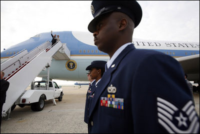 President Bush and First Lady Laura Bush board Air Force One at Andrews Air Force Base for their departure to Vienna, Austria June 20, 2006.