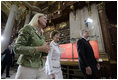 President George W. Bush and Laura Bush are led by Johanna Rachinger, Director General of the National Library in Vienna, after they arrived for a tour Wednesday, June 21, 2006, and a roundtable with foreign students.