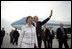 President George W. Bush waves as he and Laura Bush arrive at Budapest-Ferihegy Airport in Budapest Wednesday night, June 21, 2006, on the last leg of their journey to Europe.