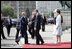 Prime Minister Ferenc Gyurcsany and his wife Dr. Klara Dobrev welcome President George W. Bush and Mrs. Laura Bush to the Hungarian Parliament building in Budapest, Hungary, Thursday, June 22, 2006.