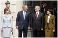 President George W. Bush, Mrs. Laura Bush, Hungarian President Laszlo Solyom and Mrs. Erzsebet Solyom participate in an official arrival ceremony at Sandor Palace in Budapest, Hungary, June 22, 2006.