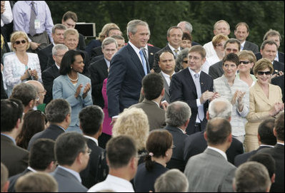 President George W. Bush walks to the podium to deliver remarks from Gellert Hill in Budapest, Hungary, Thursday, June 22, 2006. "Laura and I are honored to visit your great nation," said President Bush. "Hungary sits at the heart of Europe. Hungary represents the triumph of liberty over tyranny, and America is proud to call Hungary a friend."