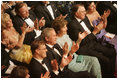 President George W. Bush and Mrs. Laura Bush join the audience in applauding the entertainment Sunday evening, June 25, 2006, at the annual Ford's Theatre gala to benefit the historic theater. The program, "An American Celebration at Ford's Theatre," will be televised on July 4, 2006.