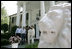 President George W. Bush, Laura Bush and Japanese Prime Minister Junichiro Koizumi are welcomed to Graceland, the home of Elvis Presley, by his former wife Priscilla Presley and their daughter Lisa-Marie Presley, Friday, June 30, 2006 in Memphis. White House photo by Eric Draper Priscilla Presley, former wife of Elvis Presley, and daughter Lisa-Marie Presley participate in the tour.