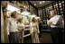 President George W. Bush, Mrs. Laura Bush, and Prime Minister Junichiro Koizumi of Japan tour the Graceland home of Elvis Presley in Memphis, Tenn. Priscilla Presley, former wife of Elvis Presley, and his daughter Lisa-Marie Presley participate in the tour.