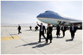 President George W. Bush gives the thumbs-up after Air Force One landed at Bagram Air Base near Kabul, Afghanistan Wednesday, March 1, 2006. The five-hour surprise visit included a meeting with Afghan President Karzai, a ceremonial ribbon-cutting at the U.S. Embassy, and a visit to the troops at Bagram.