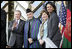 President George W. Bush waves as he stands with President Hamid Karzai of Afghanistan, Mrs. Laura Bush and Secretary of State Condoleezza Rice during welcoming ceremonies Wednesday, March 1, 2006, in Kabul.