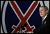 President George W. Bush addresses U.S. and Coalition troops Wednesday, March 1, 2006, during a stopover at Bagram Air Base in Afghanistan, prior to his visit to India and Pakistan.